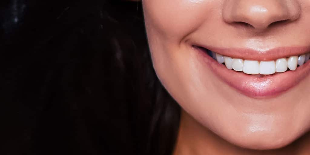 dental patient smiling after procedure Voorhees, NJ